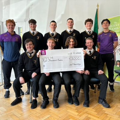 Students from St Paul’s College, Raheny receiving the fundraising cheque