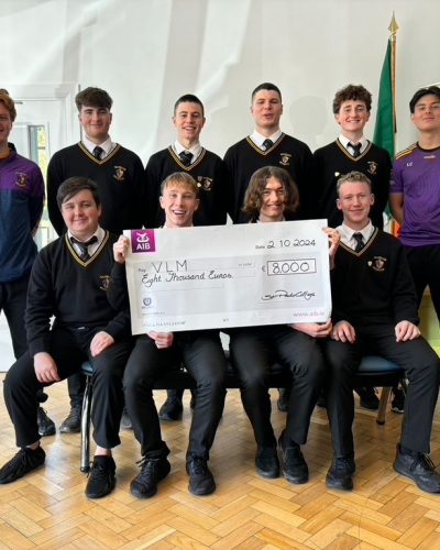 Students from St Paul’s College, Raheny receiving the fundraising cheque